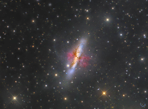 M82: Starburst Galaxy with a Superwind : M82 is a starburst galaxy with a superwind. In fact, throug