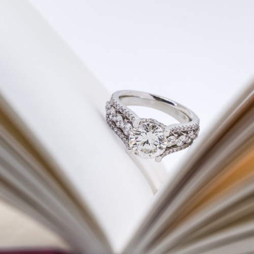 diamond engagement ring in a little book.
