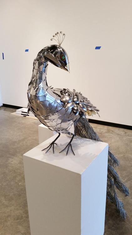 steampunktendencies:    Life-sized Peacock Sculpture made of spoons and other metal found objects by Liddlenomnom  