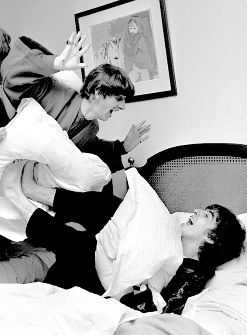 sheismylittlerocknroll: The Beatles having a pillow fight, photographed by Harry Benson in 1963. &ld