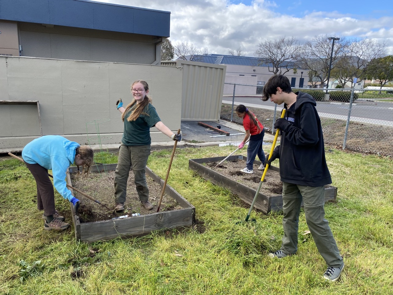 This weekend, Scouts from Troop 318 gathered at Donald Graham Elementary School to help a neighboring Girl Scout with her Gold Award project!