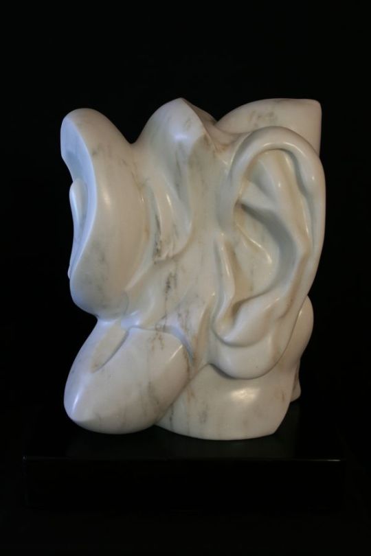 A sculpture titled Listen (Carved Stone Human and Plant Part sculpture) by sculptor Denis Yanashot. In a medium of Vermont Danby White Marble. #artist#sculpture#sculptor#art#fineart#Denis Yanashot#Marble#stone#limited edition