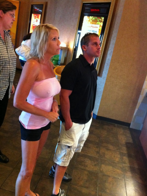 carelessnaked: Showing nipples poking out of her dress