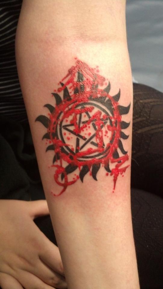 kikistiel:  My new tattoo! I couldn’t decide between the angel sigil or the anti-possession symbol