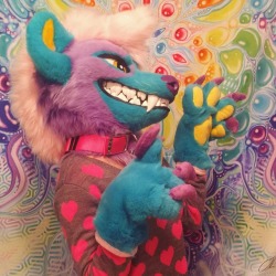 fursuitpursuits:RT @serieswvsk: Your serving of rainbows and hyenas for the day 🌈 https://t.co/3aFo1bmnEM (Source) omg that toothy grin is the best!