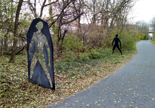 existentialterror: voidbat:  dolphinsjukebox:  Every Wednesday I walk a river walk trail from my work to rowing, and there’s this sculpture on the trail:  Pokemon Go affectionately refers to it as “The Hollow Man”, and it’s kind of cool on it’s