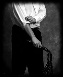 luciasmaster:  The exertion of the initial whipping has warmed me, so I remove my suit jacket and hang it over the back of the chair.  Looking down at you (still kneeling with your head bowed, your eyes shrouded in total darkness), I remove my cuff-links