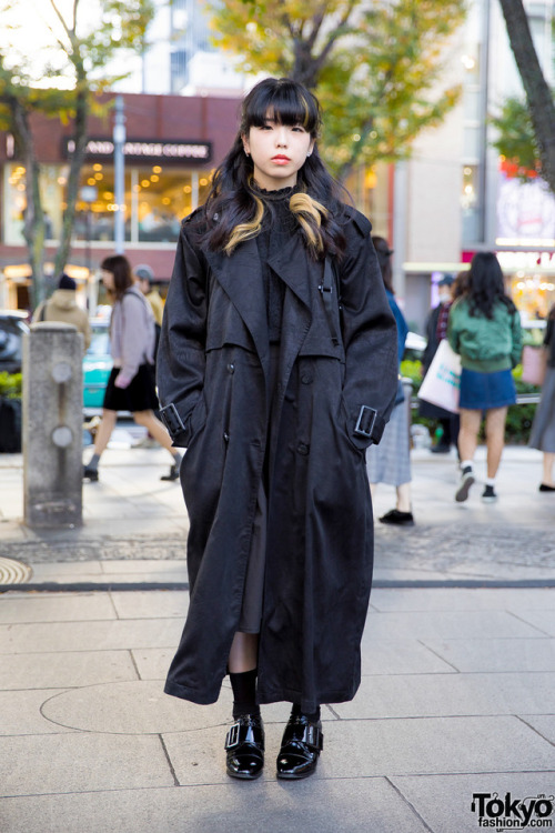 20-year-old Noe on the street in Harajuku wearing a dark winter look with a long coat by Perverze ov