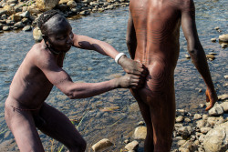 Ethiopian Surma men, by Georges Courreges.