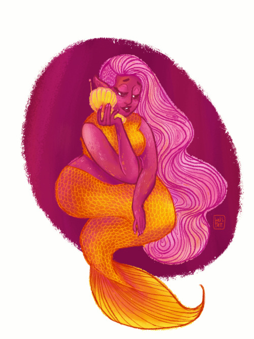 a cute fat mermaid using her shellphone