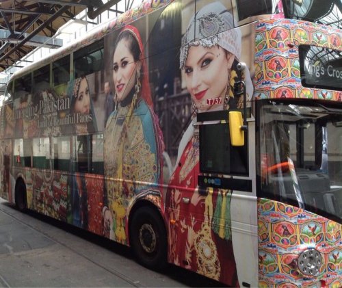  Double-Decker buses in London showing colours of Emerging Pakistan. 