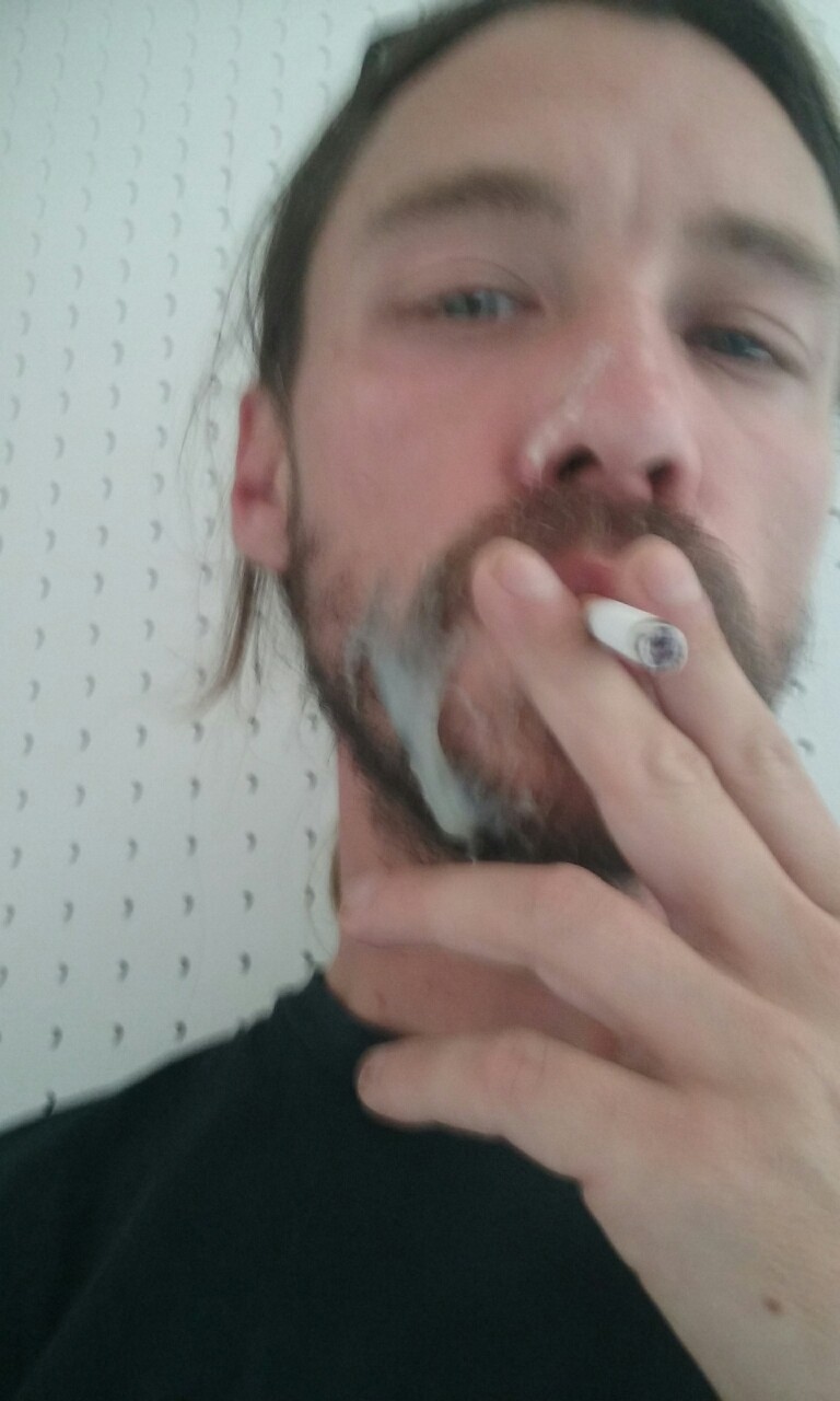 tattootodd80:  Enjoying a smoke with my face covered on cum