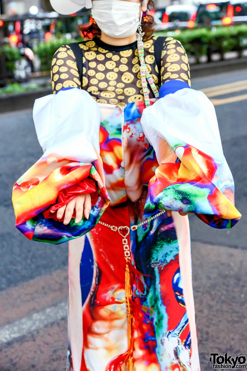 Japanese fashion designer/student Sakuran on the street in Harajuku wearing colorful handmade fashio