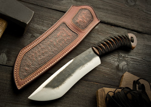 carbon-steel-life-form:  unknown maker but a stunning recurve knife 