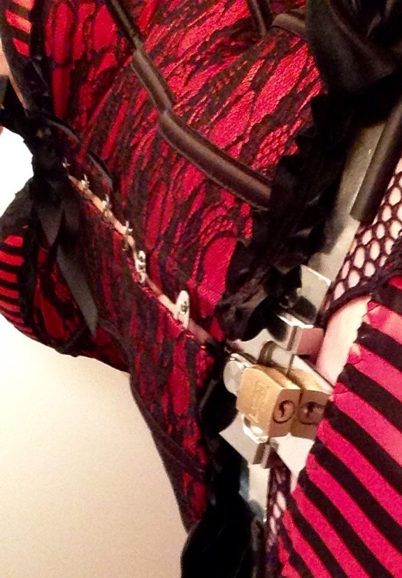 merrylander: Red, black, fishnet hose and the stainless belt this morning are brought