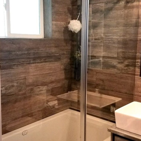 Salt Lake City 3/4 Bath BathroomBathroom - Mid-sized Rustic 3/4 Porcelain Tile Bathroom Idea With Brown