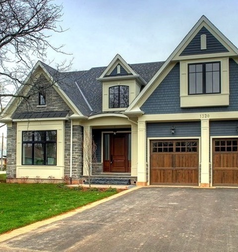 Toronto VinylInspiration For A Mid-sized Timeless Blue Two-story Vinyl Exterior Home Remodel With A Tile