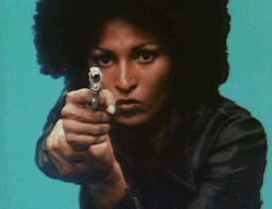 black-woman-dominating-white-man:  Goddess with a gun 