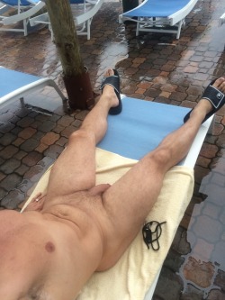 jay-jones-us:  I noticed the rooftop sundeck was unoccupied, so decided to work on the tan lines. Being naked in public with a risk of being caught gets me horny, so it wasn’t long before I was stroking my hard cock right out in the open. I guess I
