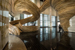 culturenlifestyle:  Exquisite Sculptural Stair Case Designed by architect Oded Halaf and crafted by Tomer Gelfand, the exquisite sculpture staircase is made from Poplar wood. Located within the Atrium office tower in Tel Aviv, Israel, the spiraling stairs