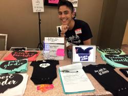 neutrois:  “Too cute to be binary” at #genderodyssey @pidgeonpagonis showing off their gorgeous display of ‪Nonbinary and Intersex tees and art at Gender Odyssey conference last week.   To bad you aren’t straight because your a good looking