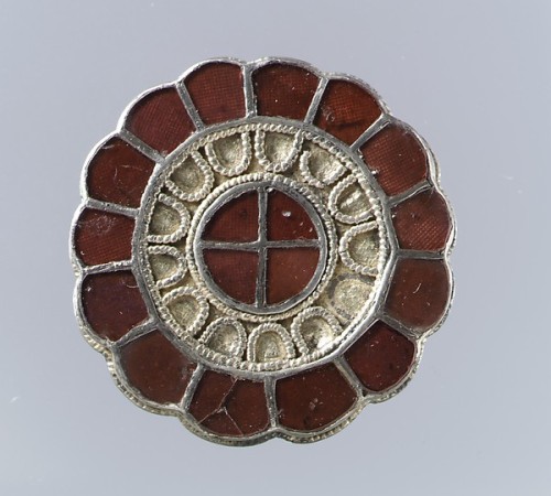 Frankish silver-gilt and garnet brooches, 6th centuryGarnets, worked in the cloisonné technique, fea