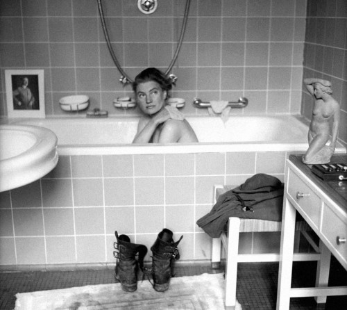 Photographer and model Lee Miller taking a bath in Adolf Hitlers bathtub. Munich, april 30th 1945