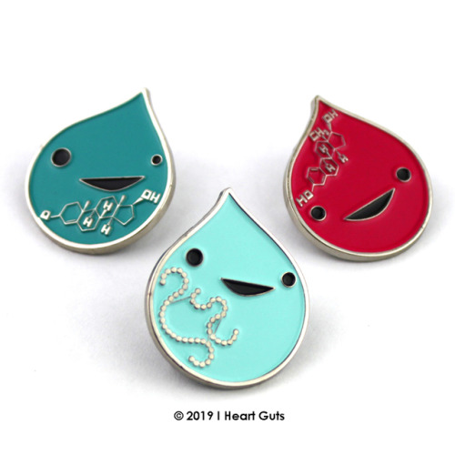Happy hormones all together! New enamel pins, from left to right: Testosterone, Insulin and Estrogen