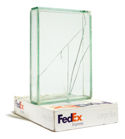 kichizone:  shihlun:  Walead Beshty’s FedEx Sculptures series(2005 - present).  Walead Beshty constructs glass vitrines that are the exact dimensions of a FedEx box, and he then places the glass boxes into a FedEx box and ships it to the exhibition