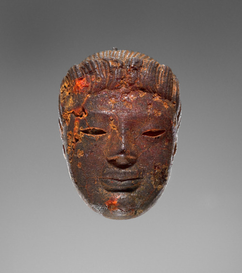 theancientwayoflife:~ Pendant: Head of a Female Divinity or Sphinx. Culture: South Italian (Apulian)
