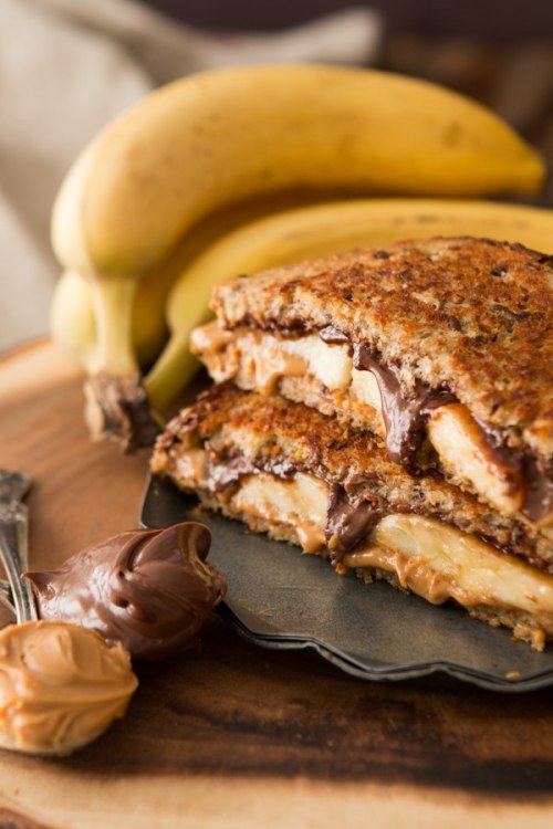 fatfoodporn:  fullcravings:  Grilled Peanut Butter Nutella Banana Sammy   See more beautiful, fatty foodporn here 🍔🍕🌭🍩🍟🌮 