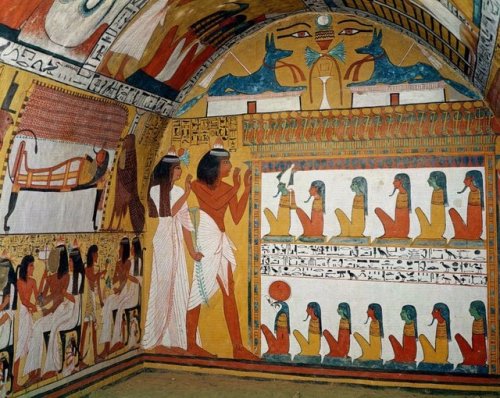 Tomb of SennedjemSennedjem and his wife facing a naos containing thirteen divinities, with Osiris an