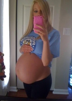 naughtypreggo:   Full Gallery - CLICK HEREIf you rather get laid - CLICK HERE  sexy.com  Almost perfect looking girl&hellip;she&rsquo;s wearing a penguins shirt&hellip;that makes her less than perfect :-)