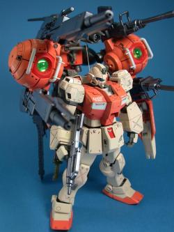 mechaddiction:  Holy crap! Someone kit-bashed a pair of shoulder mounted guns using 1/144 balls and a bunch of guns. That’s a GM I could pilot. #mecha – https://www.pinterest.com/pin/156148312060521485/