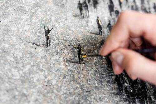 Welcome MatMadrid-based artist Pejac has created a stunning hand painted welcome matt made of minusc