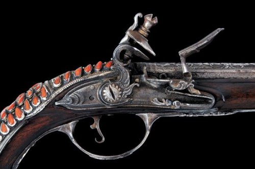 peashooter85:An original silver and coral mounted flintlock pistol originating from Italy, late 18th