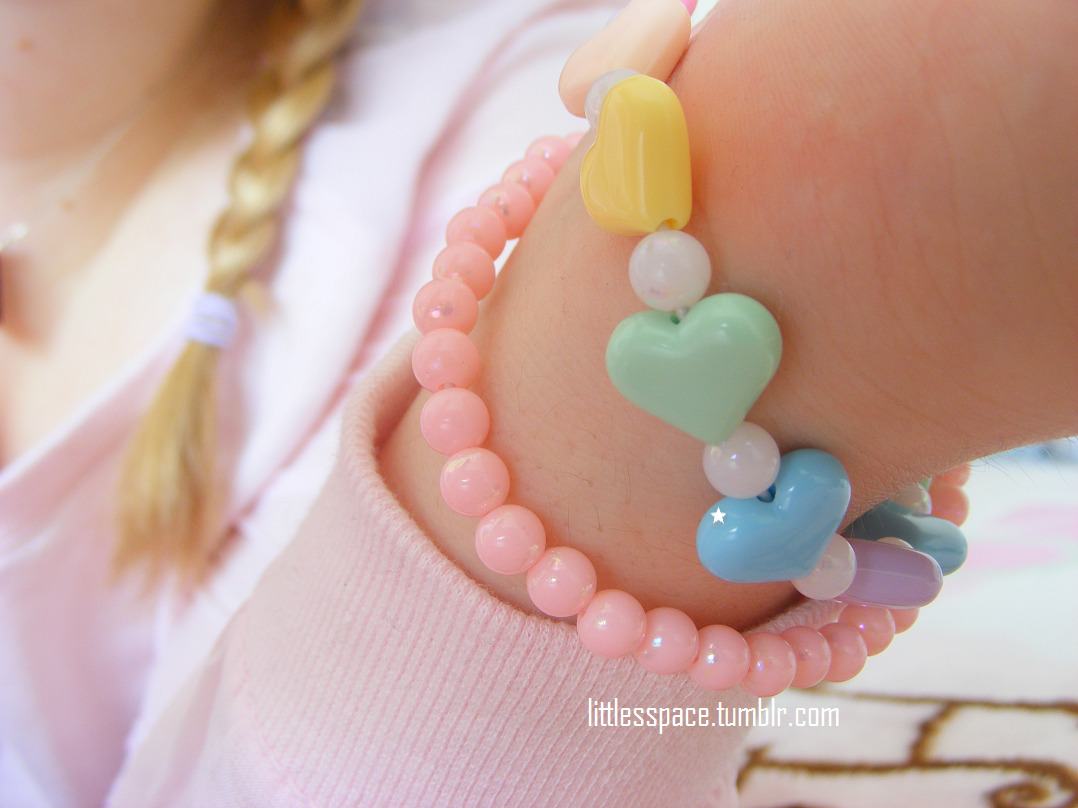 littlesspace:  I love my pink shirt. And my I LOVE DADDY paci. And my rainbow-heart
