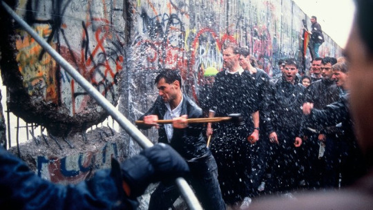 scottbaiowulf: ensignspace:    cracking open berlin wall with the boys     Cracking open a Cold War with the Boys 