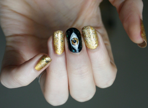 ladycrappo:  The Cosmic Eye, or: Every Gold Polish I Own At Once 