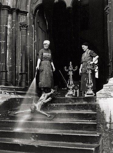 jocollins: thewolfbroughtindoors:  historicaltimes:   Cleaning women washing a crucifix, 1938 via reddit   Me, thinking they’re hosing an emaciated child down the stairs: oh jesus… Me, realizing it is in fact our lord and savior on the cross: oh,