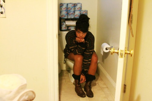 Girls pooping on the toilet.