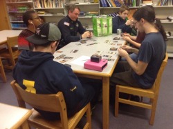 megachikorita:  there was a big drug problem at my school so they hired a police officer to supervise students but now he’s playing magic the gathering with the video game club   tht looks like my school