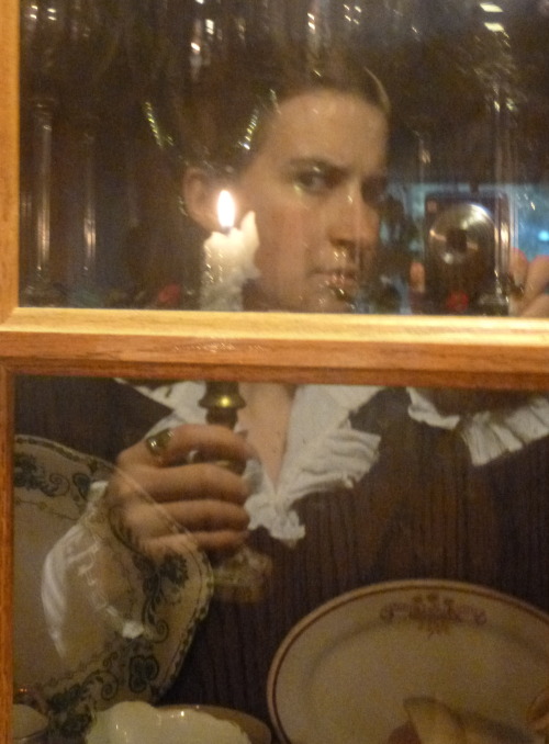 I tried to take some selfies in the China cabinet window.