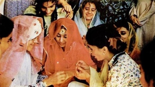 vintageindianclothing:A MOCK WEDDING is enacted by Pakistani girls. The “bride”, Raiza K