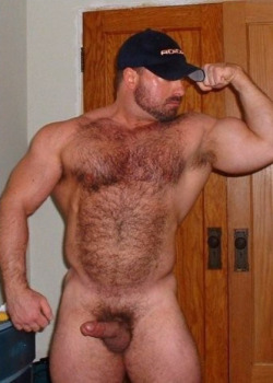 Another of the sexy muscle bear - sporting wood.