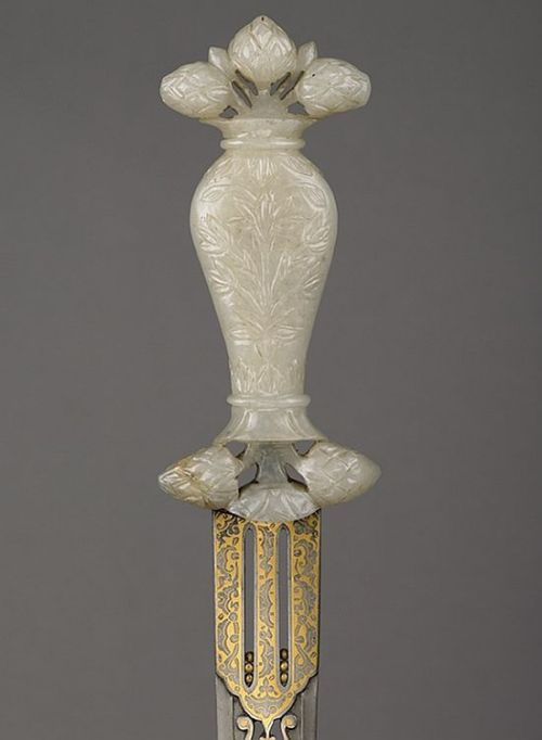 art-of-swords:  Ceremonial Dagger Dated: 16th century - 17th century Culture: Indian and Iranian Medium: carved jade and Khorássán steel Measurements: blade length 19.6 cm Source: Copyright © 2015 The Wallace Collection 