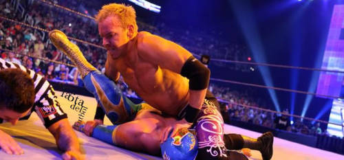 rwfan11:  Christian and Sin Cara ….this is one hot pin! Something tells me Christian must have been in this position before! Who knew he was so dominate! 