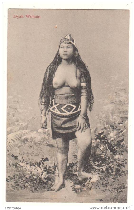 Dyak woman, via Delcampe.