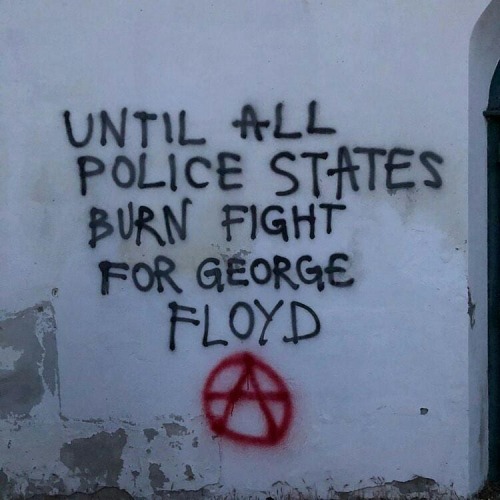 &ldquo;Until all police states burn, fight for George Floyd&quot; Graffiti in Cesena, Italy, referen