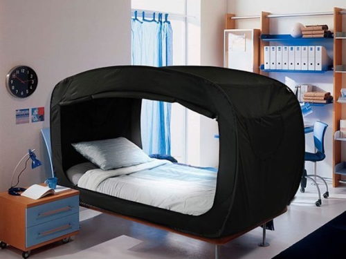 bestfunny:  Privacy Pop is  a tent that attaches to most beds (depending on the size) to create a dark little cocoon to sleep in peacefully. Not only does is block that little annoying light coming from the window, but it also shields you from the curious